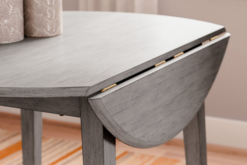 Mesa de comedor redonda Shullden con alas abatibles
