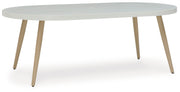 Seton Creek Oval Dining Table with Umbrella Option