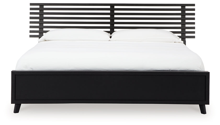 Danziar King Panel Bed with Mirrored Dresser, Chest and Nightstand